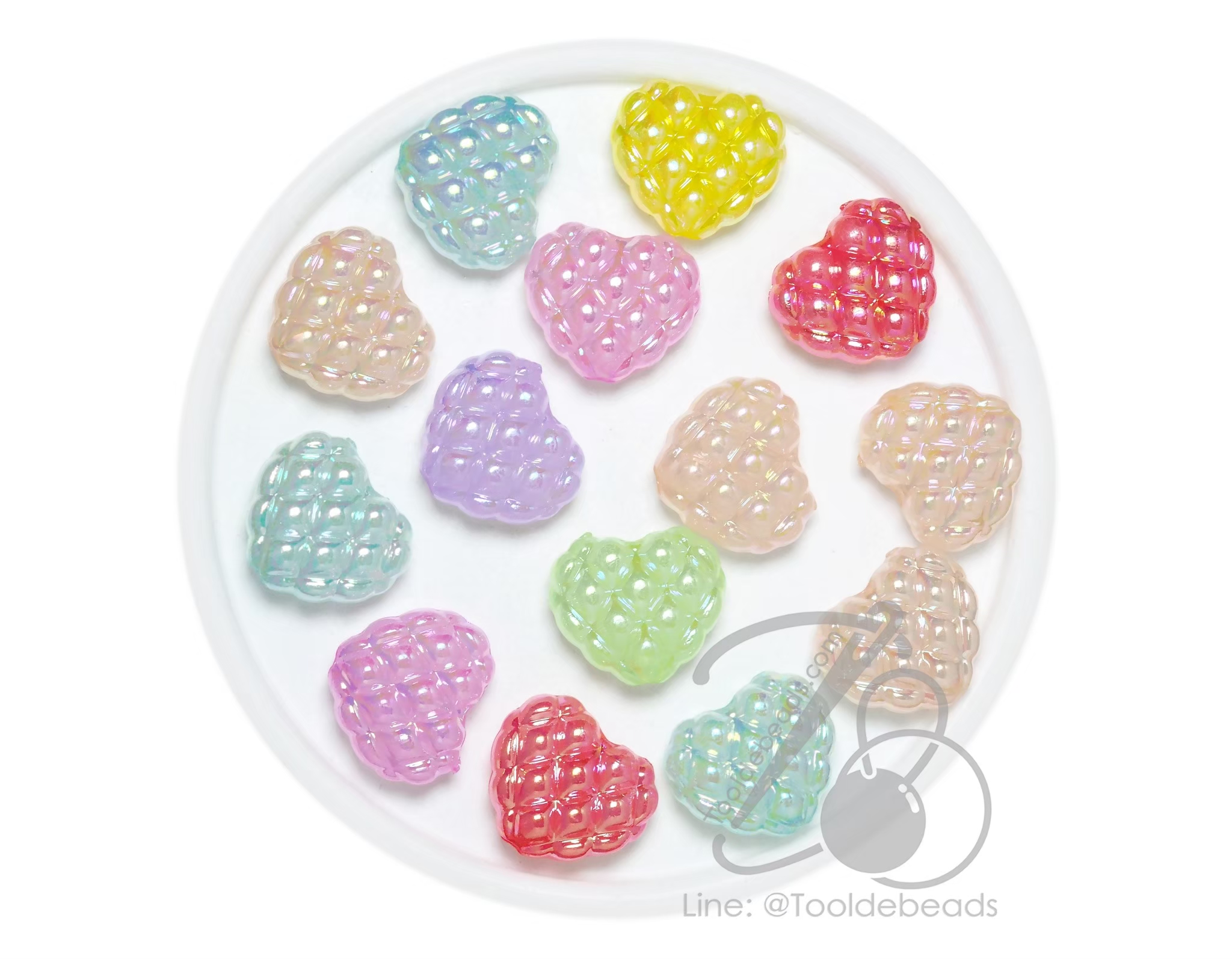 ลูกปัดพลาสติก เคลือบรุ้ง 20มม. ลายหัวใจถัก คละสีเยลลี่หวาน (10 กรัม) SKU-17899