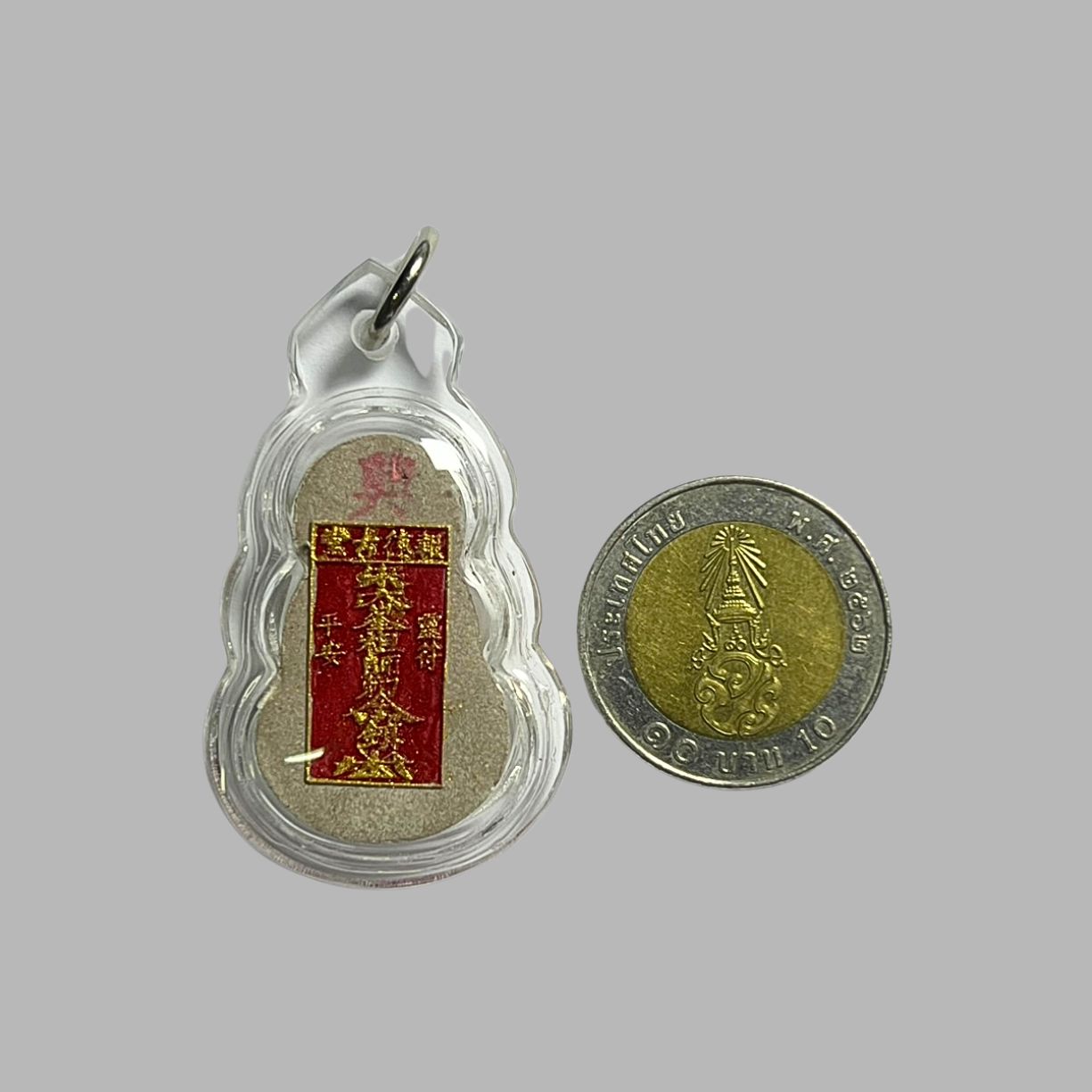 พระเนื้อผงพุทธคุณไต้ฮงกงโจวซือ ด้านหลังประทับตราฮู็ของท่าน เนื้อผงเพ้นท์สีสวยมากค่ะหายากค่ะ