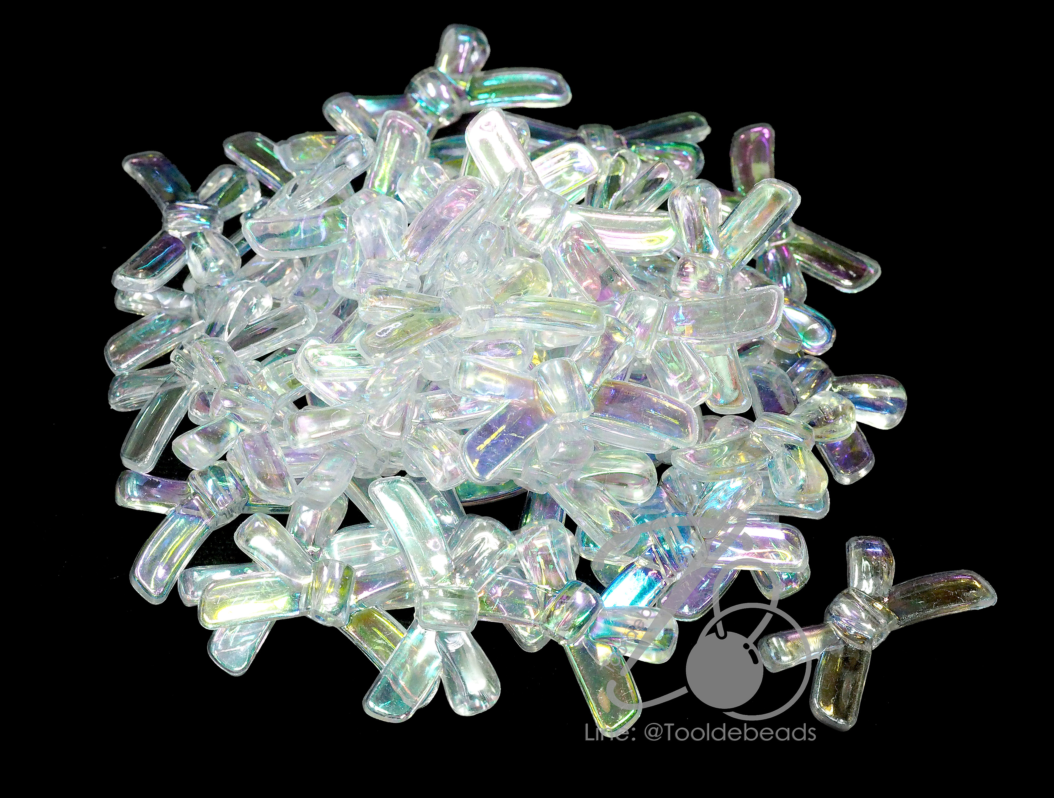 ลูกปัดพลาสติก เคลือบรุ้ง 30มม. ลายโบว์มีหาง สีขาวรุ้งใส (500 กรัม) SKU-15510
