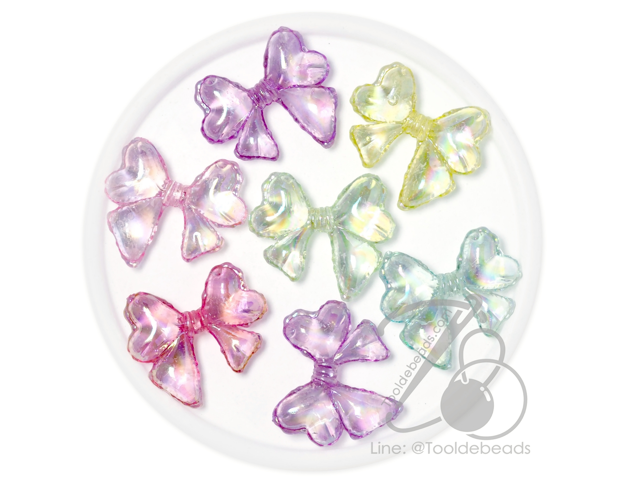 ลูกปัดพลาสติก เคลือบรุ้งAB 31มม. ลายโบว์มีหาง คละสีรุ้งใส (80 กรัม) SKU-17987