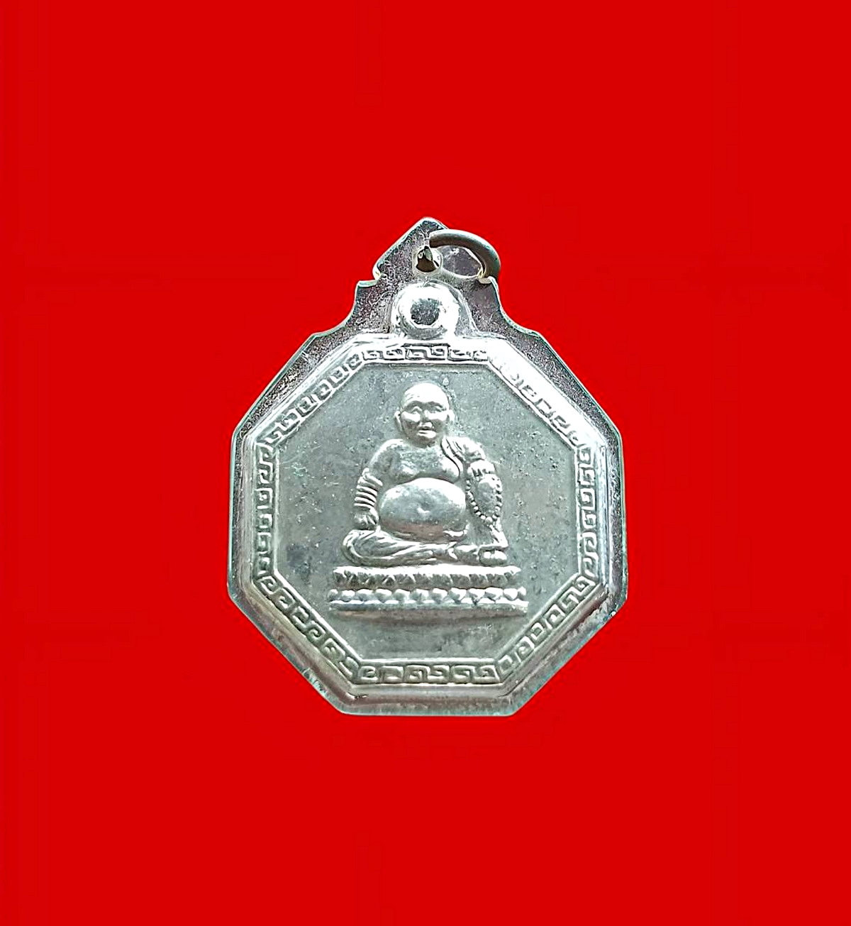 เหรียญแปดเหลี่ยมพระสังกัจจายน์วัดท่าไม้จ.สมุทรสาครเนื้อกะไหล่เงิน