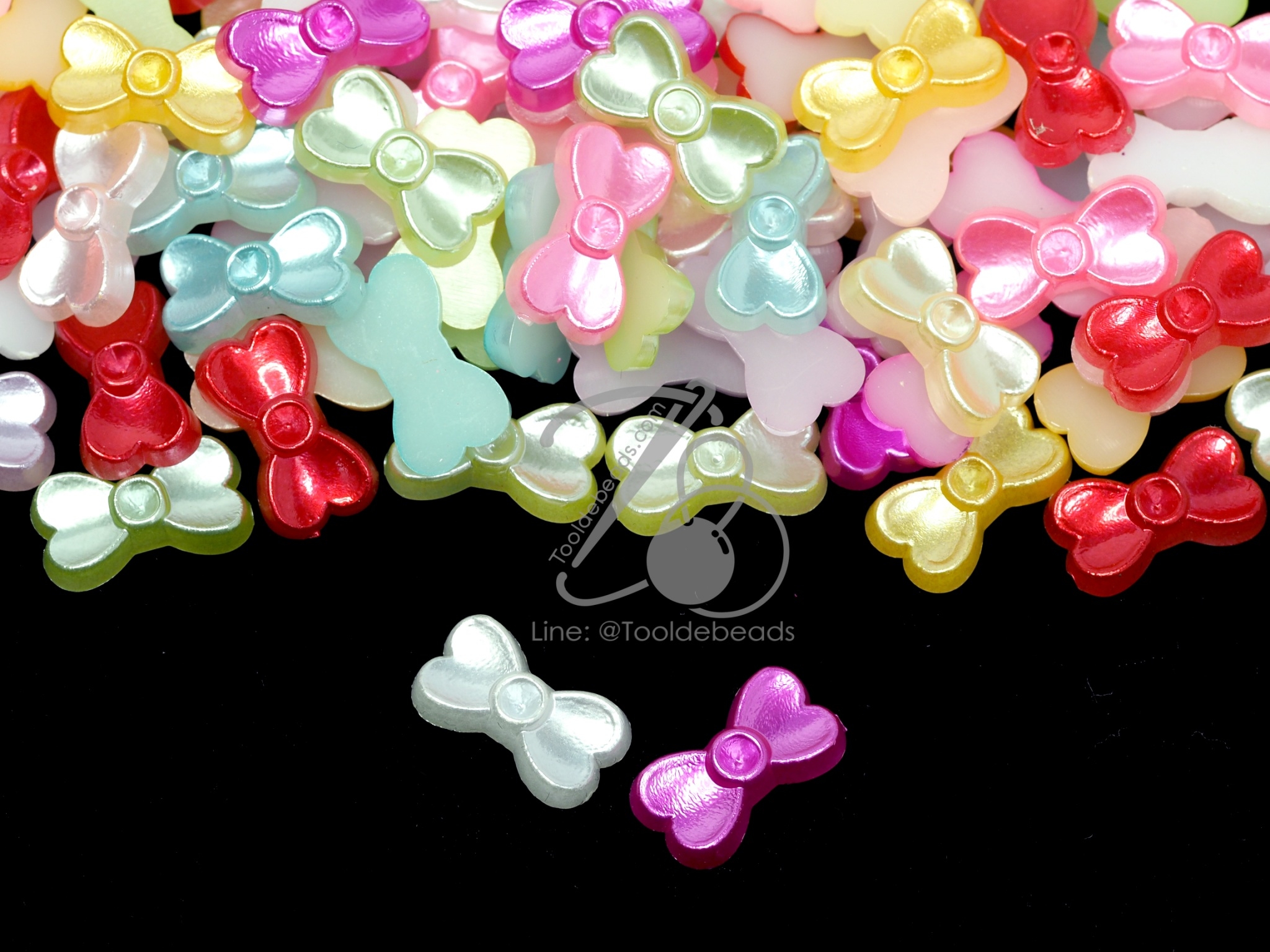 มุกครึ่งซีก 8*14มม. ลายโบว์ คละสี (15 กรัม) SKU-09877