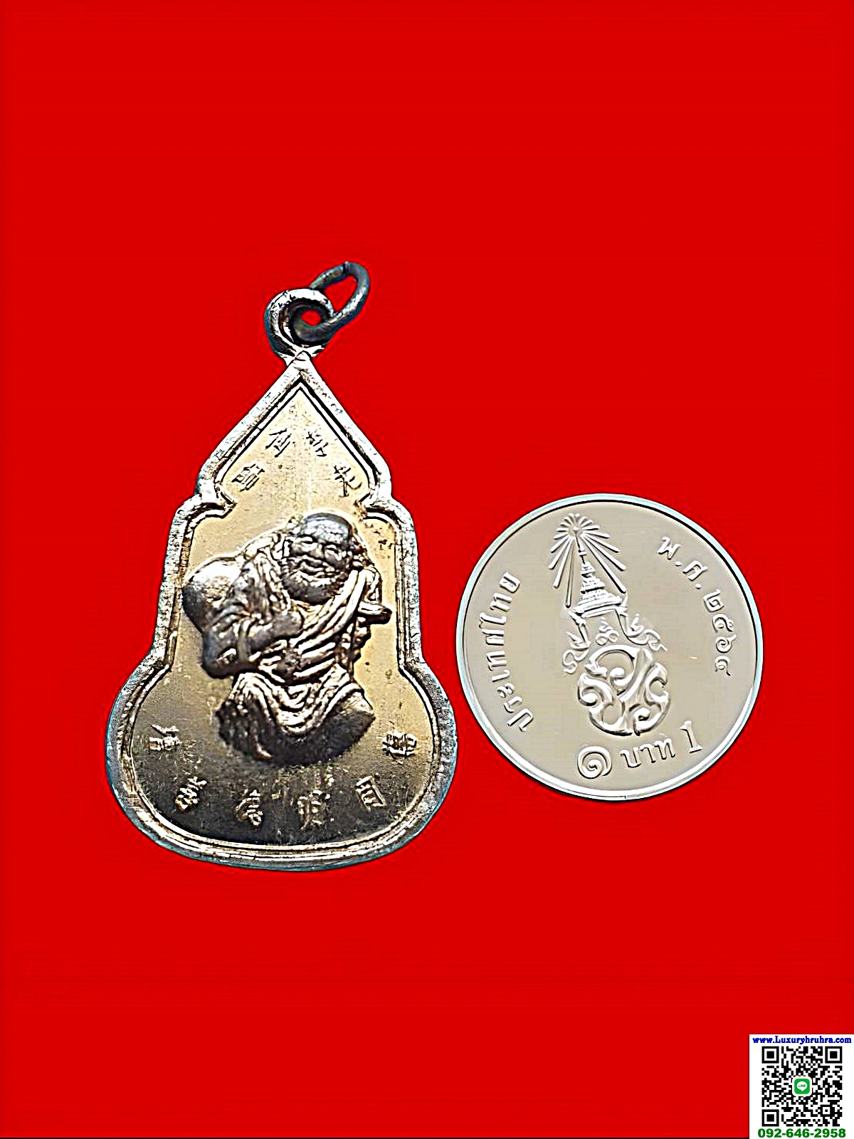 เหรียญองค์เทพเจ้าหลี่เถียไกว่หรือลี้ทิไกว้โป๊ยเซียนด้านหลังพระพุทธชินราชมูลนิธิสว่างกุศลธรรมสถานเนื้อกะไหล่ทอง