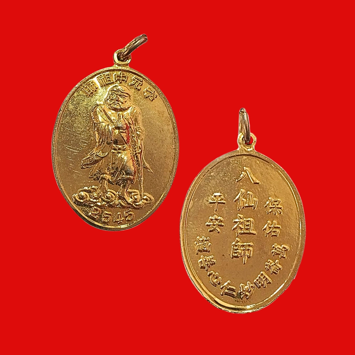เหรียญองค์ทิไกว้ลี้แปดเซียนปีพ.ศ.2545เนื้อกะไหล่ทอง
