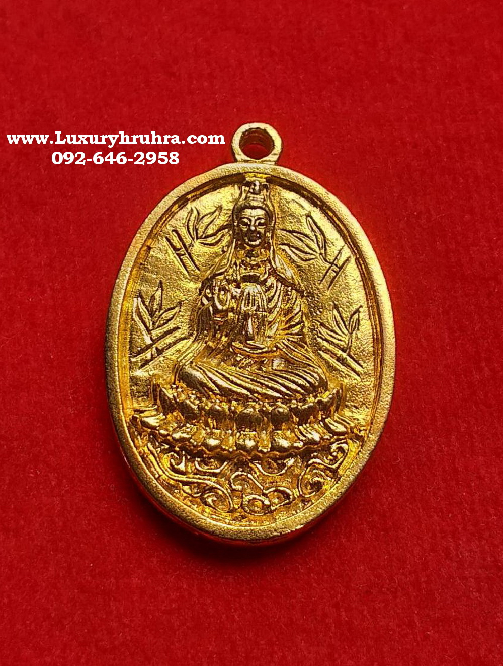 เหรียญพระโพธิสัตว์เจ้าแม่กวนอิมด้านหลังตั้กม้อโจวซือเนื้อกะไหล่ทอง