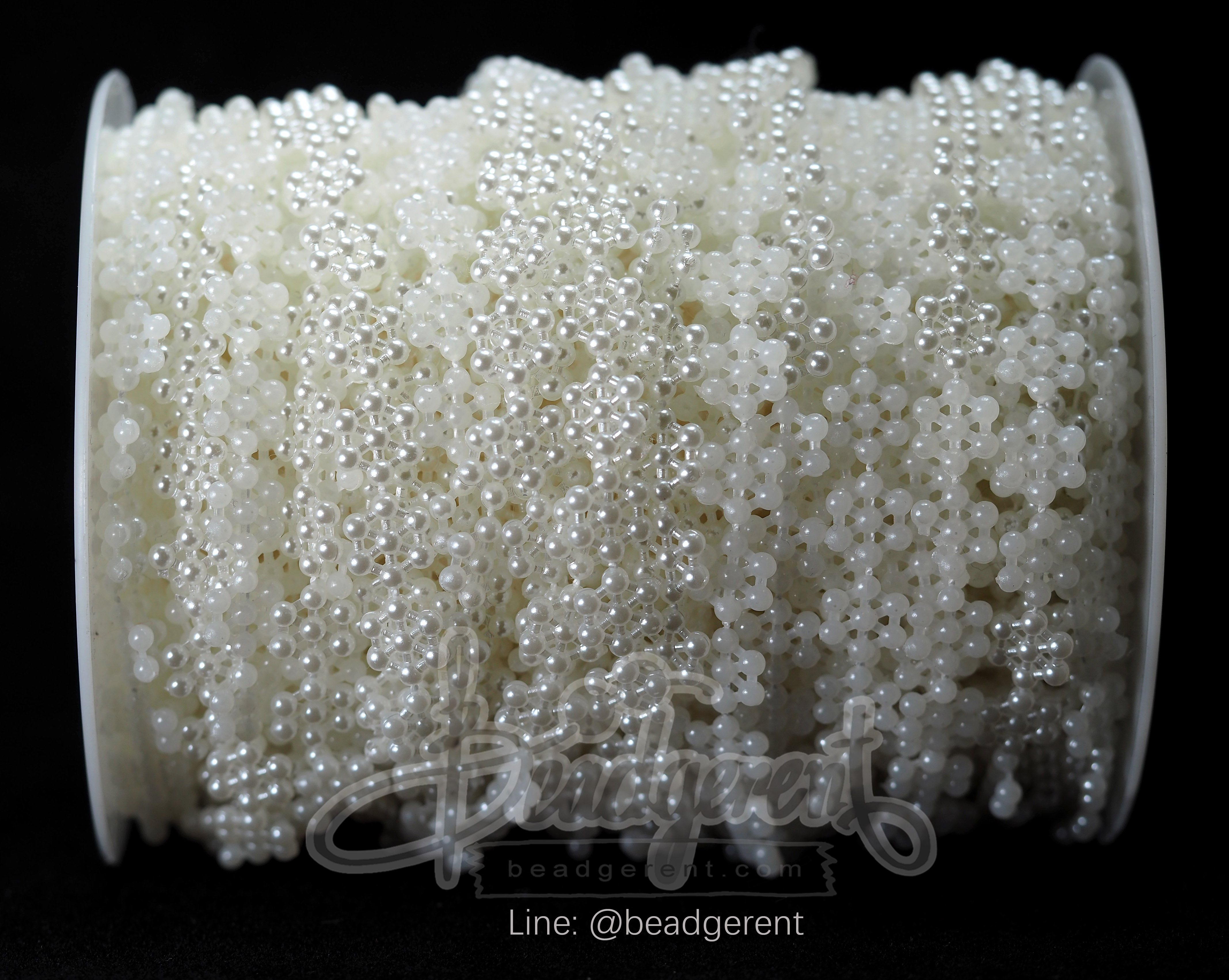 มุกเส้น 11มม. ลายมุกล้อม6จุด สีขาว (25 หลา) SKU-01850