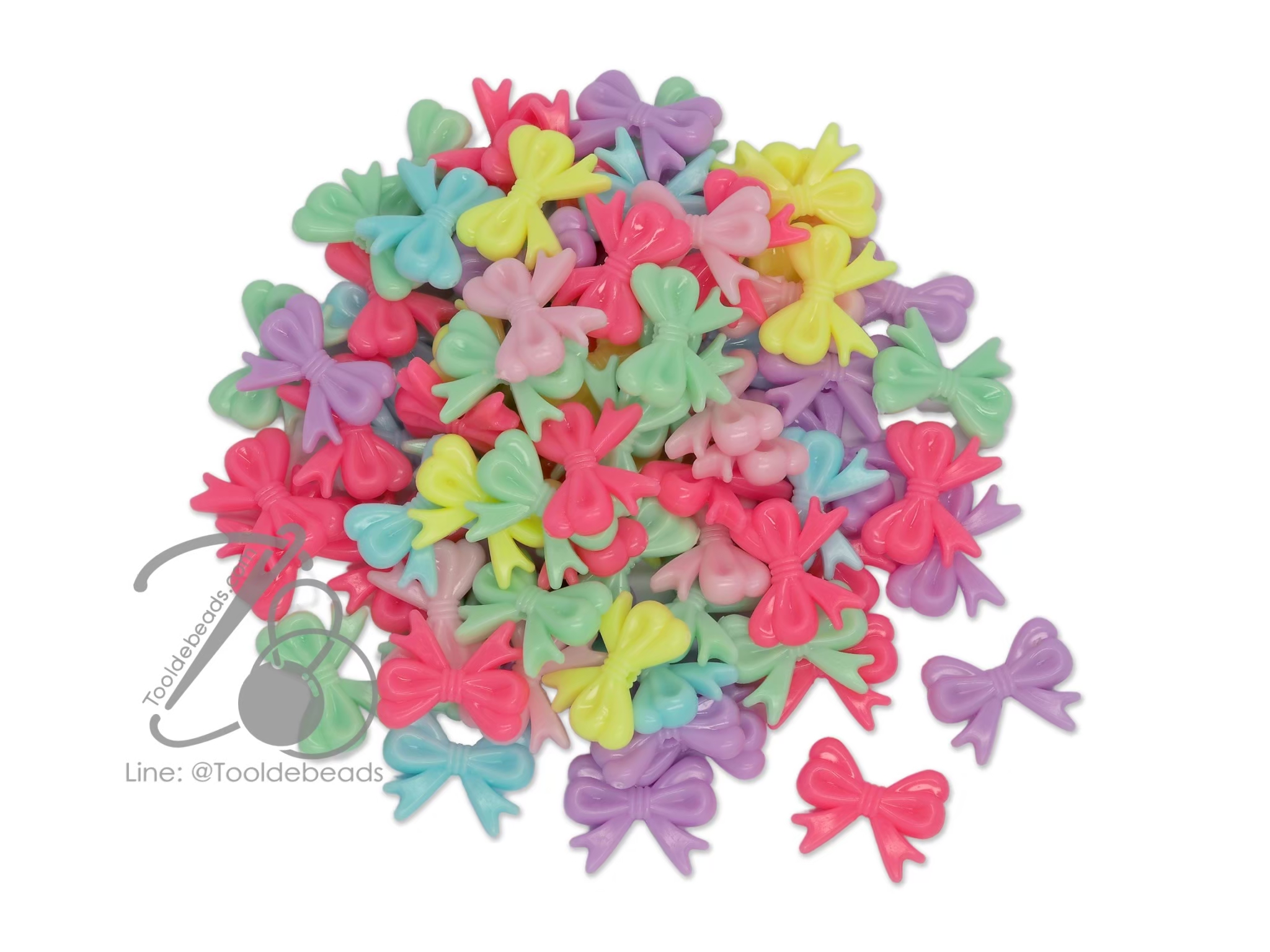 ลูกปัดอะคริลิค 19*15มม. ลายโบว์มีหาง คละสีหวาน (15 กรัม) SKU-12217