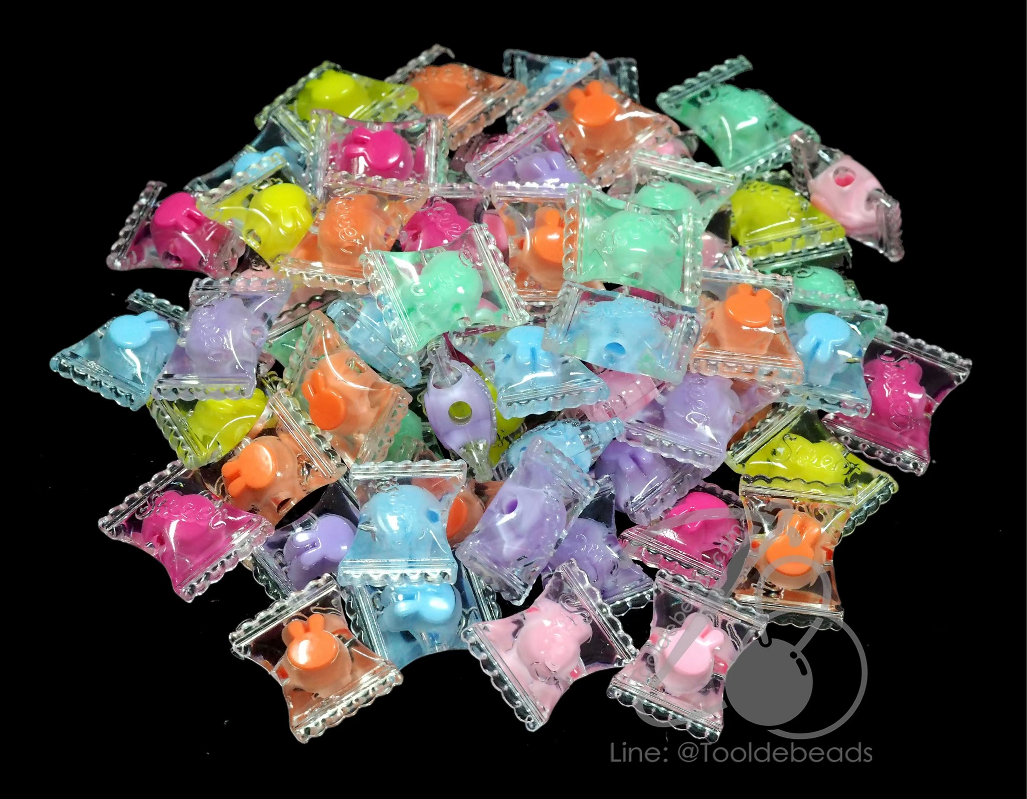 ลูกปัดอะคริลิค 17*22มม. ลายลูกอมสอดไส้ สีใส (500 กรัม) SKU-17923