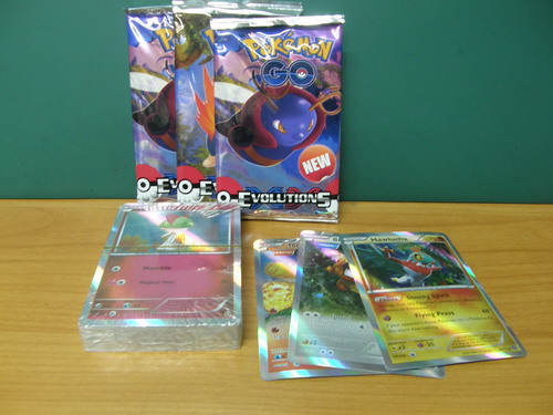 การ์ดโปเกมอน 1 ชุดใหญ่+3แพ็ค พร้อมกล่องโลหะ