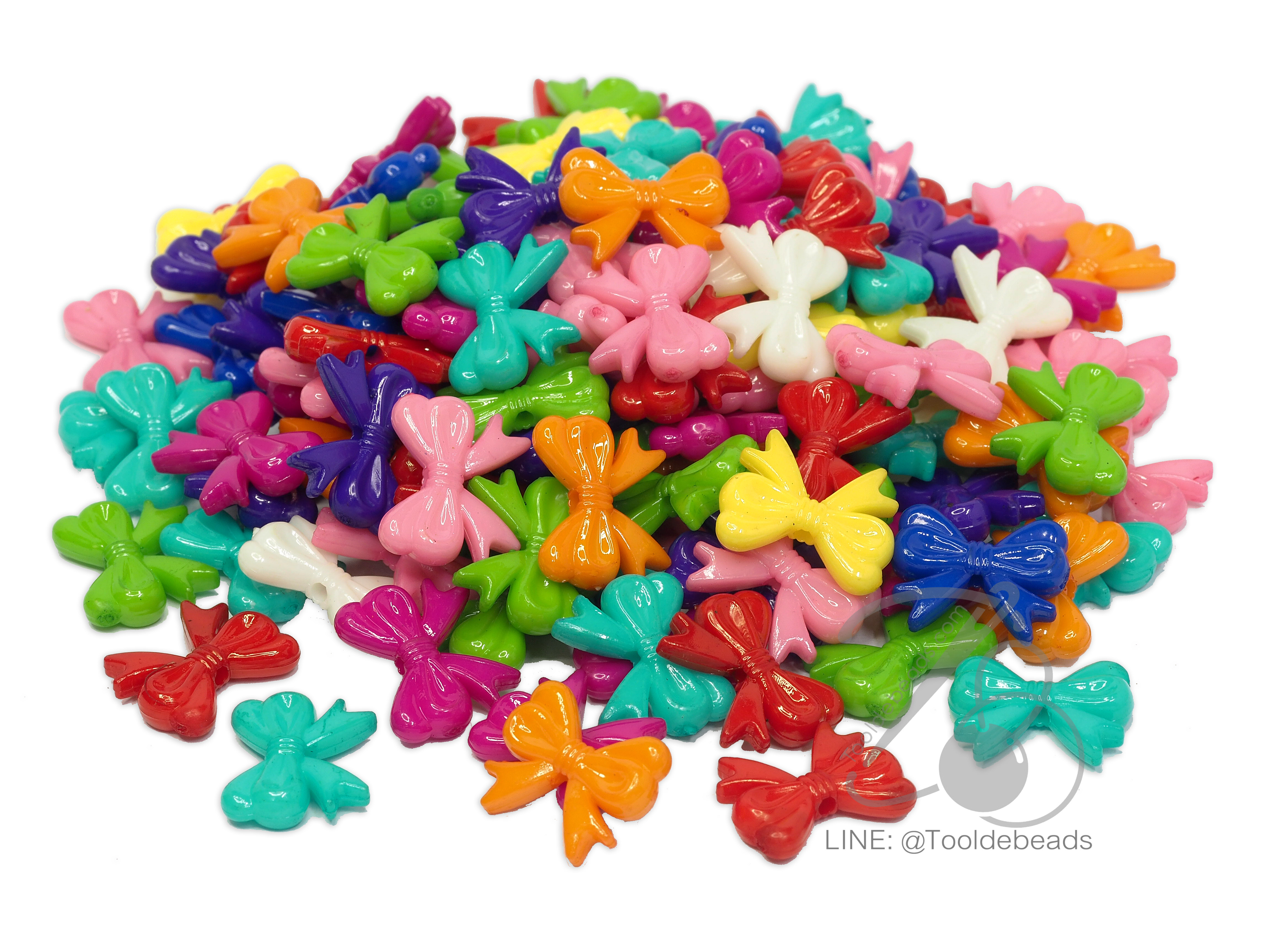 ลูกปัดอะคริลิค 19*15มม. ลายโบว์มีหาง สีสด (100 กรัม) SKU-06924