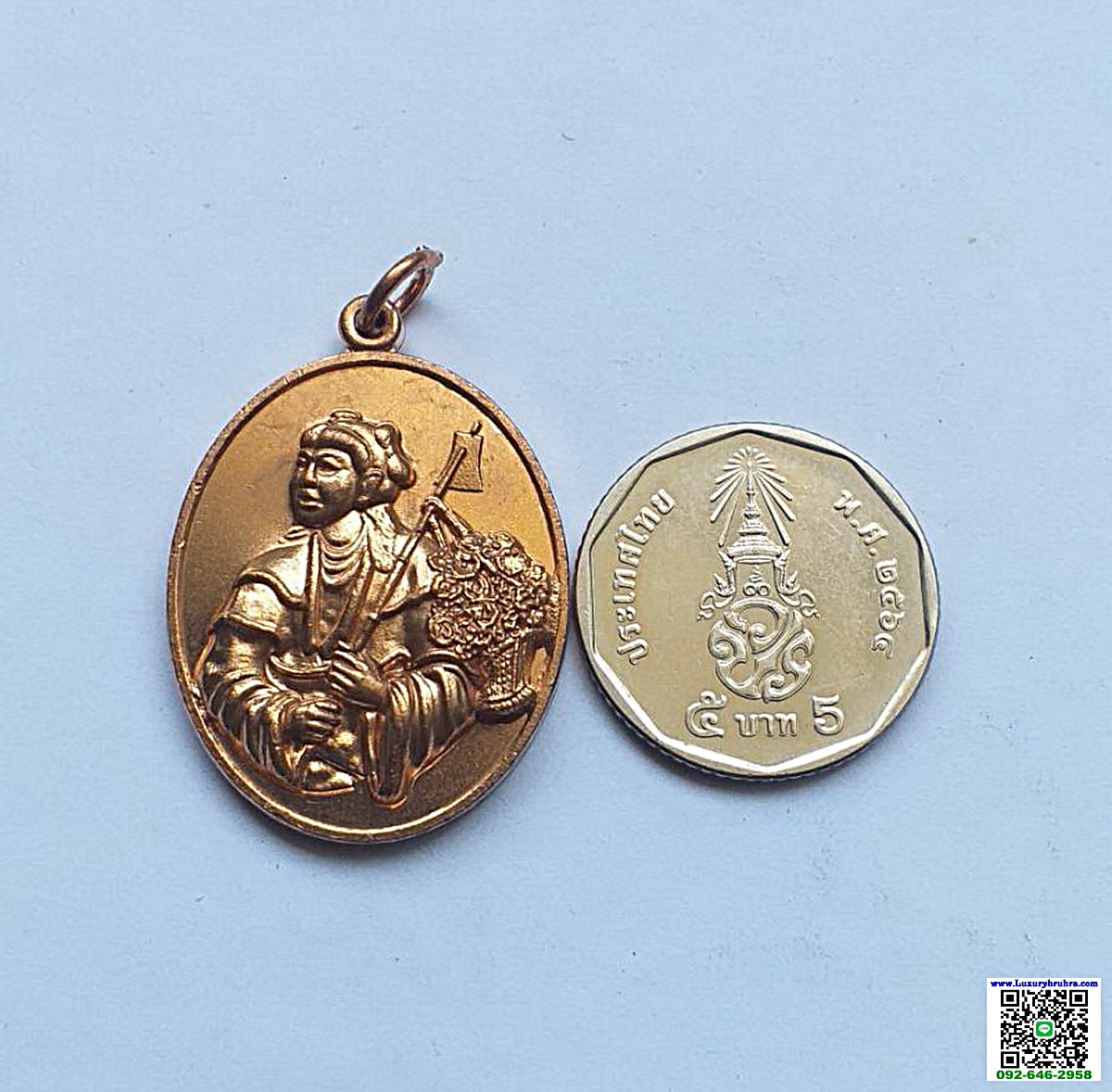 เหรียญเทพเจ้าน้าไฉฮั้วโจวซือมูลนิธิไตรสรณะพุทธสมาคม(เม่งหุย)จ.ชลบุรีปีพ.ศ.2556เนื้อทองแดง