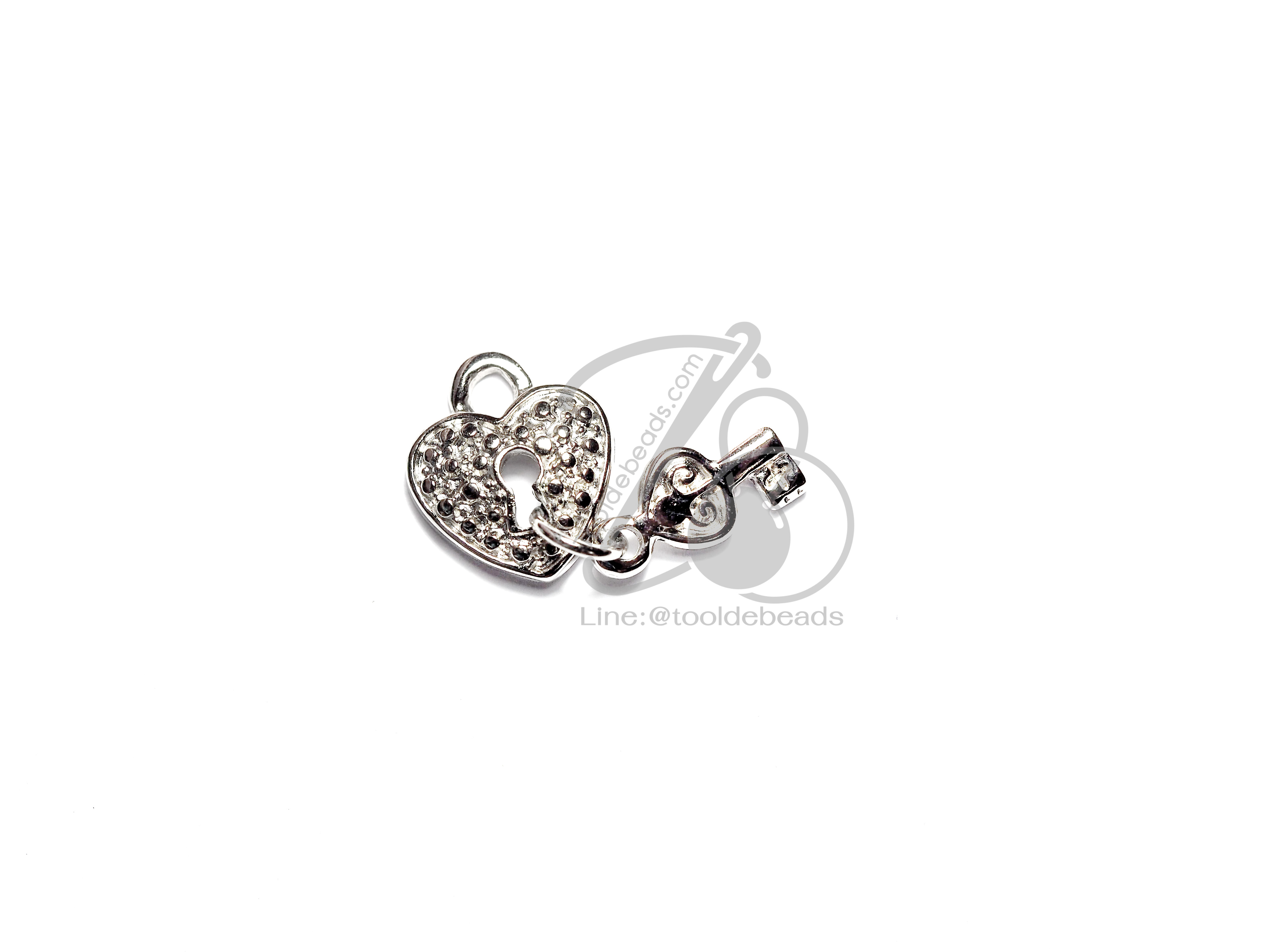 จี้เหล็ก 473 14มม. ลายกุญแจคู่ สีเงิน (1 ชิ้น) SKU-06048