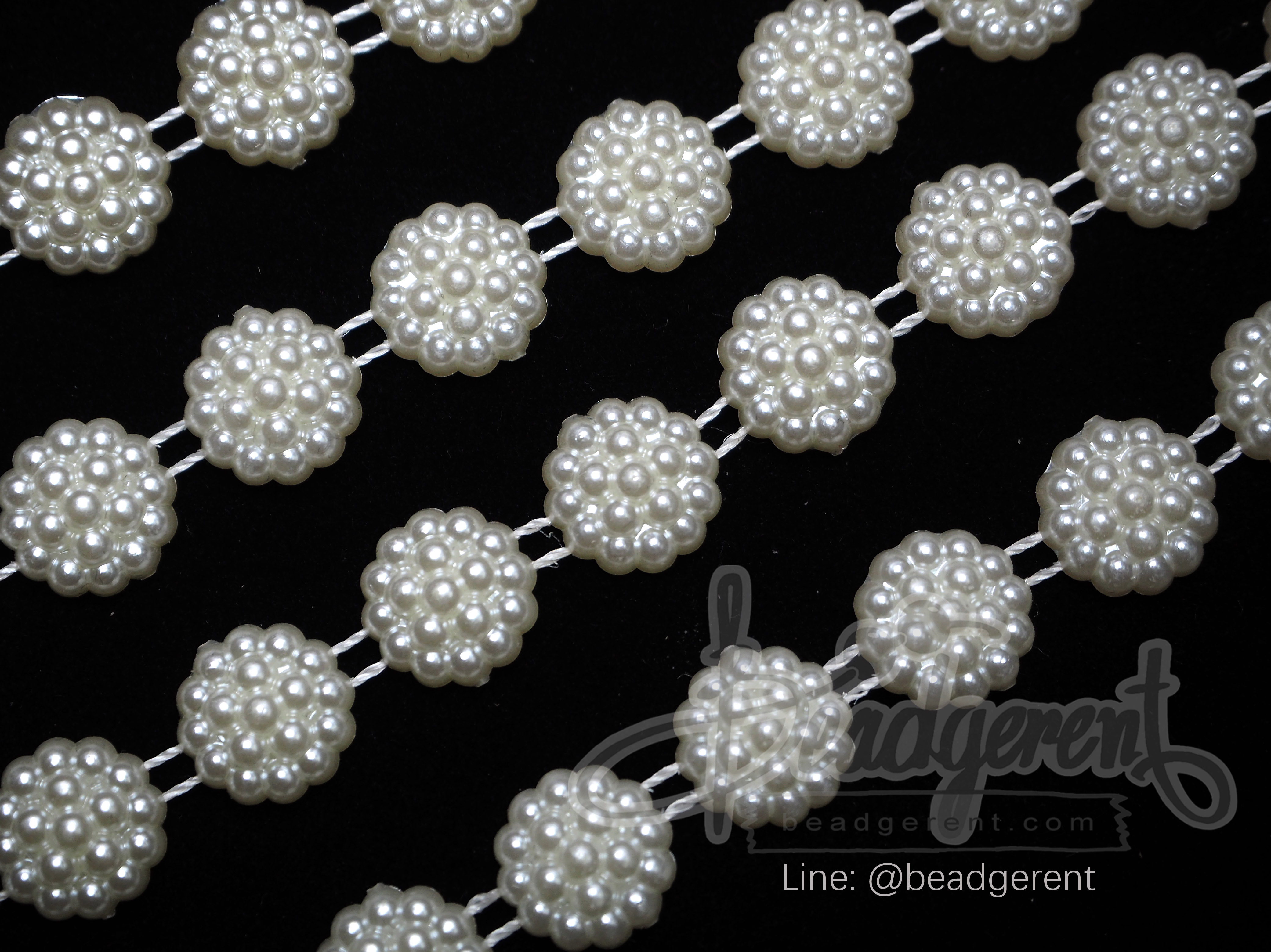 มุกเส้น 10มม. ลายดอกไม้ สีครีม (1 หลา) SKU-01829