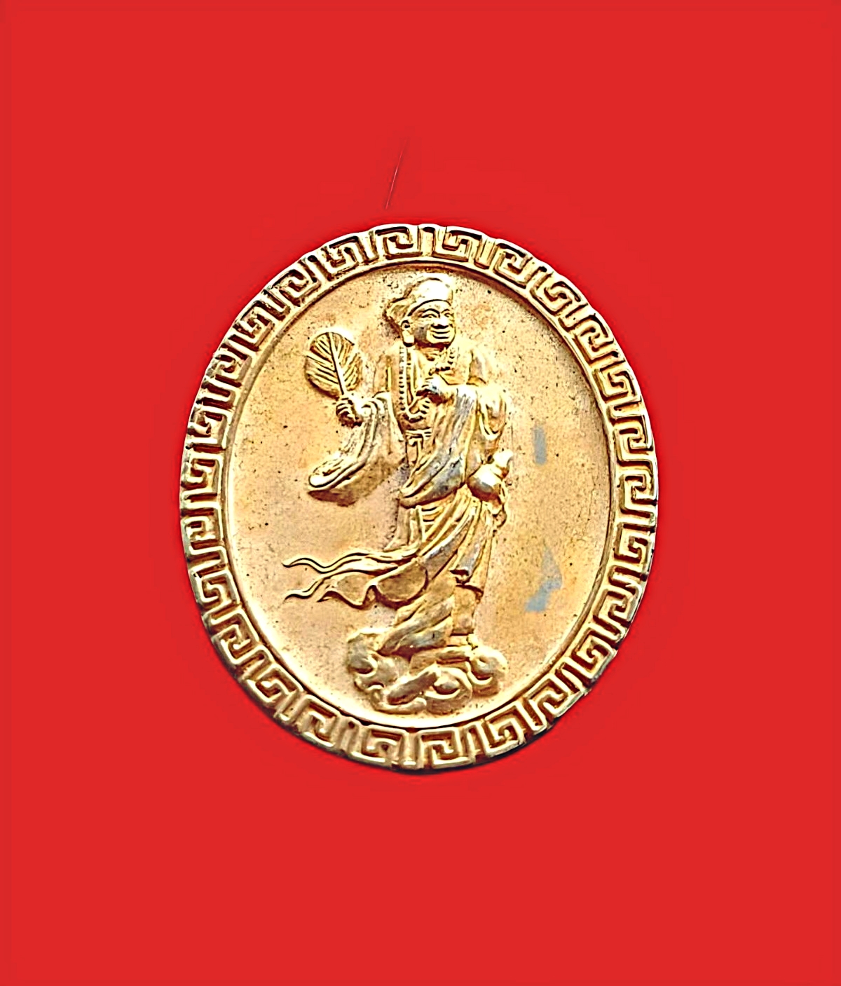เหรียญพระอรหันต์เจ้าจี้กงรุ่นจับหยี่กีเนื้อกะไหล่ทอง