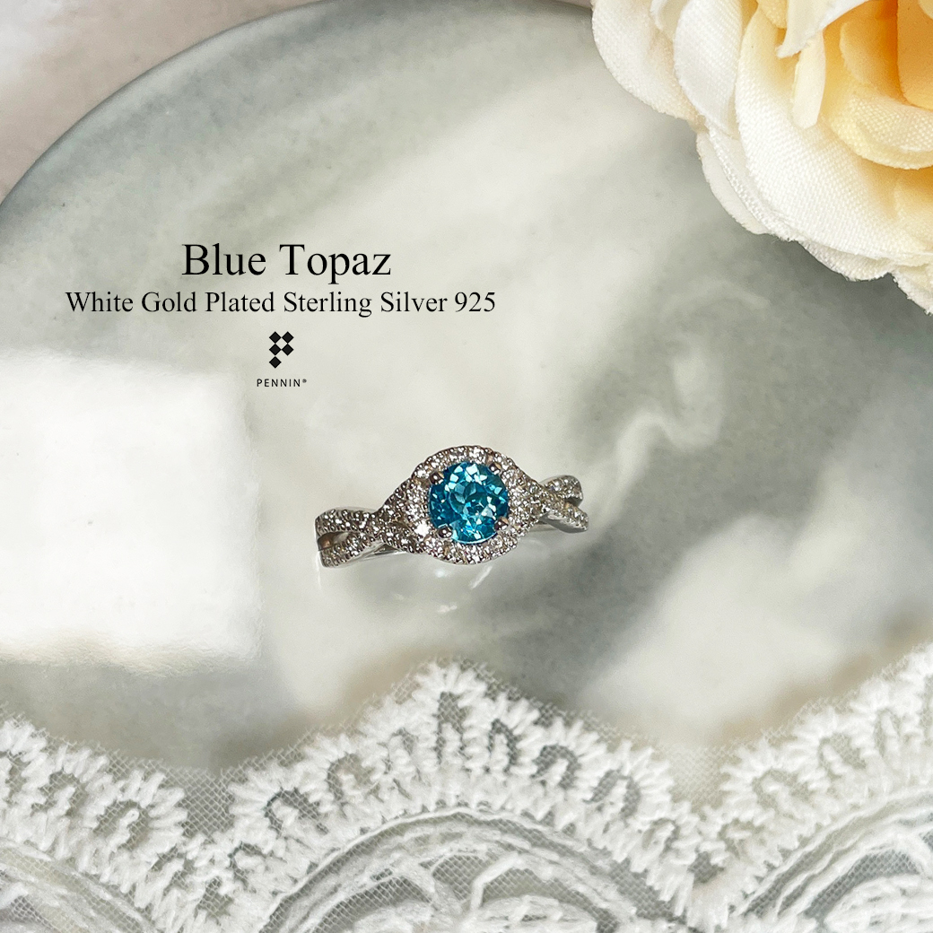HILISE: แหวน Blue Topaz ล้อมเพชรสวิส CZ ไขว้ Infinity เงินแท้ 925 ชุบทองคำขาว สวยหวาน เสน่ห์เกินต้าน