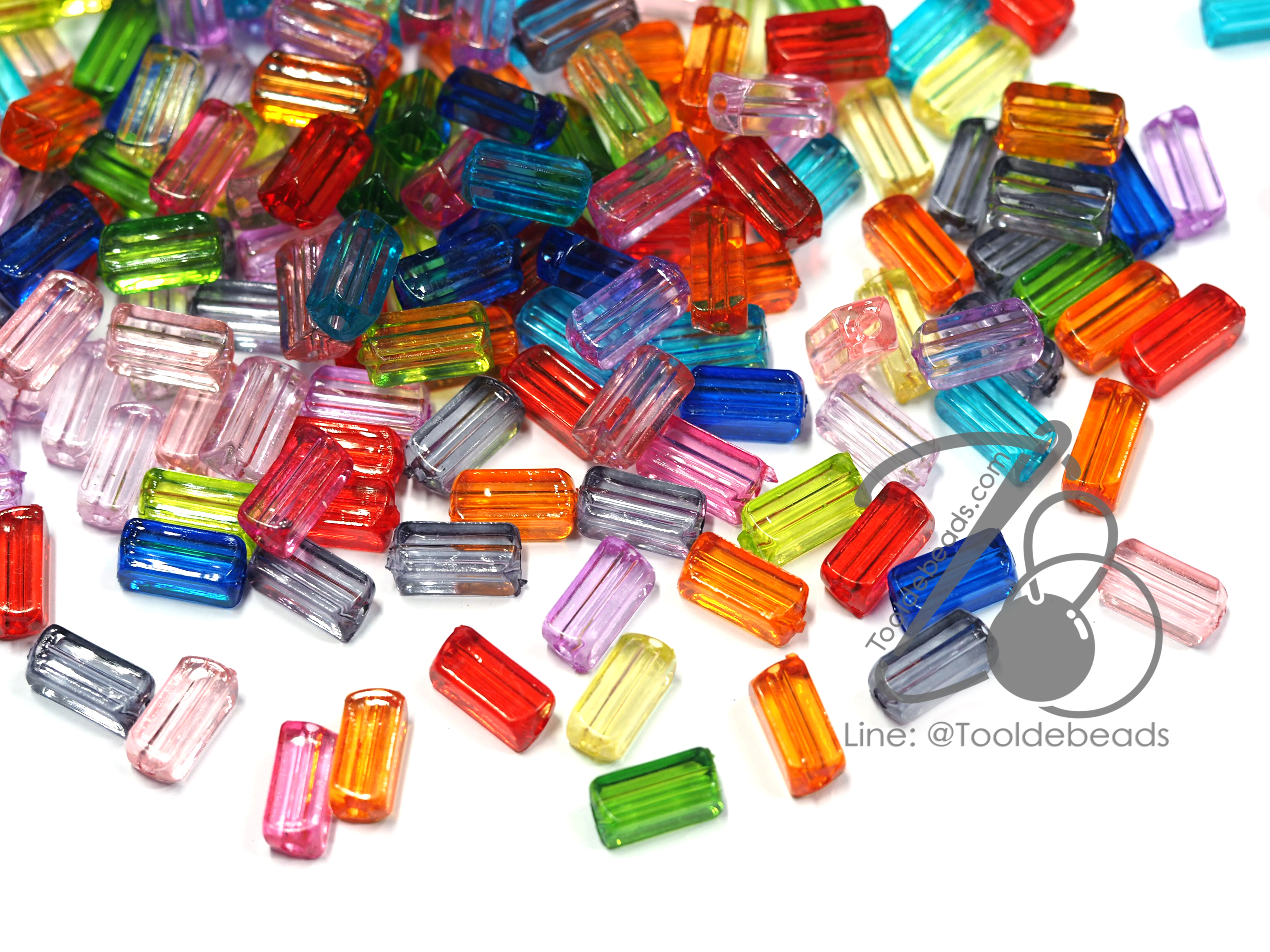 ลูกปัดอะคริลิค 6*12มม. ลายแท่งเหลี่ยม คละสีใส (500 กรัม) SKU-13334