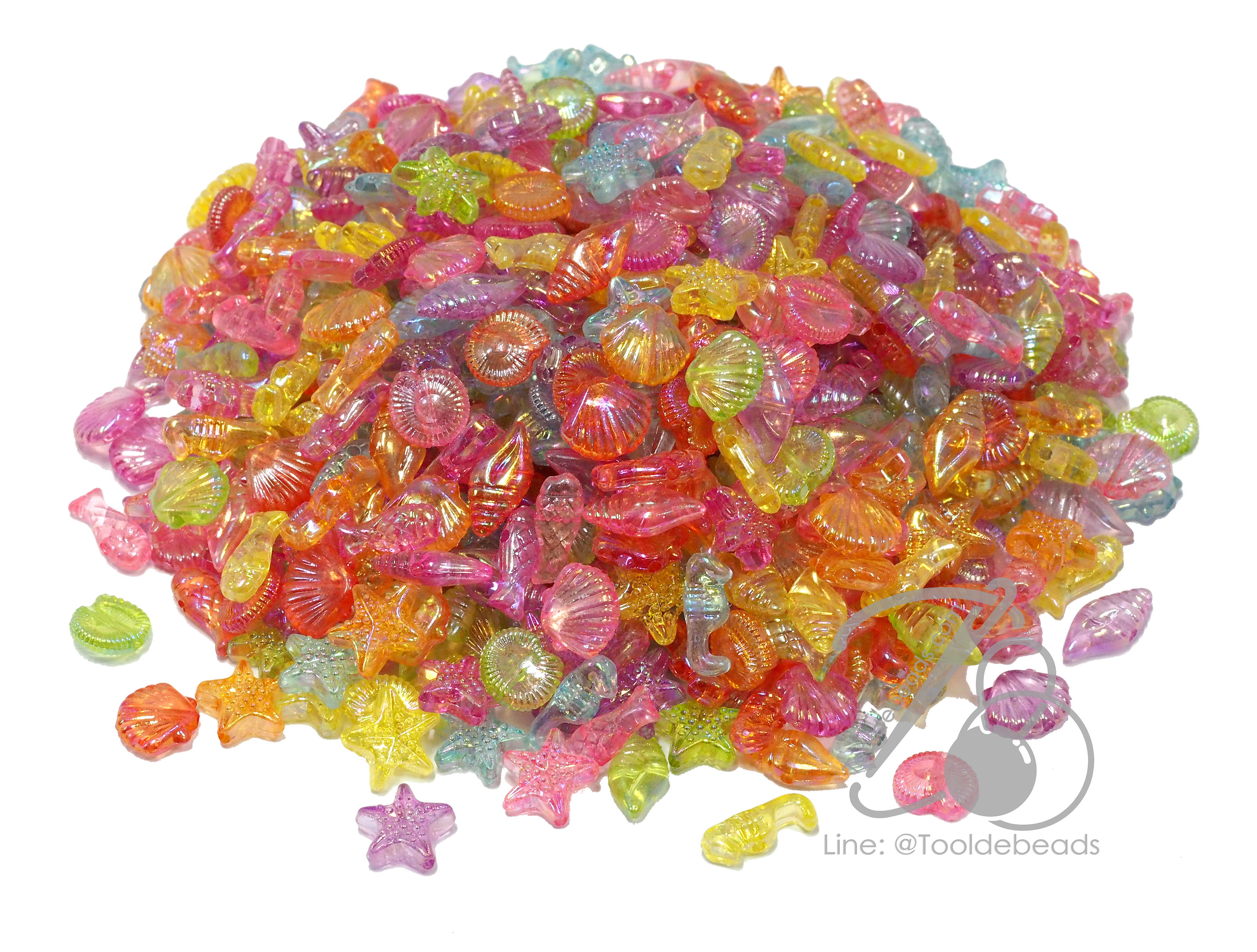 ลูกปัดพลาสติก เคลือบรุ้ง 10*12มม. ลายทะเล คละสีใสรุ้ง (100 กรัม) SKU-14357