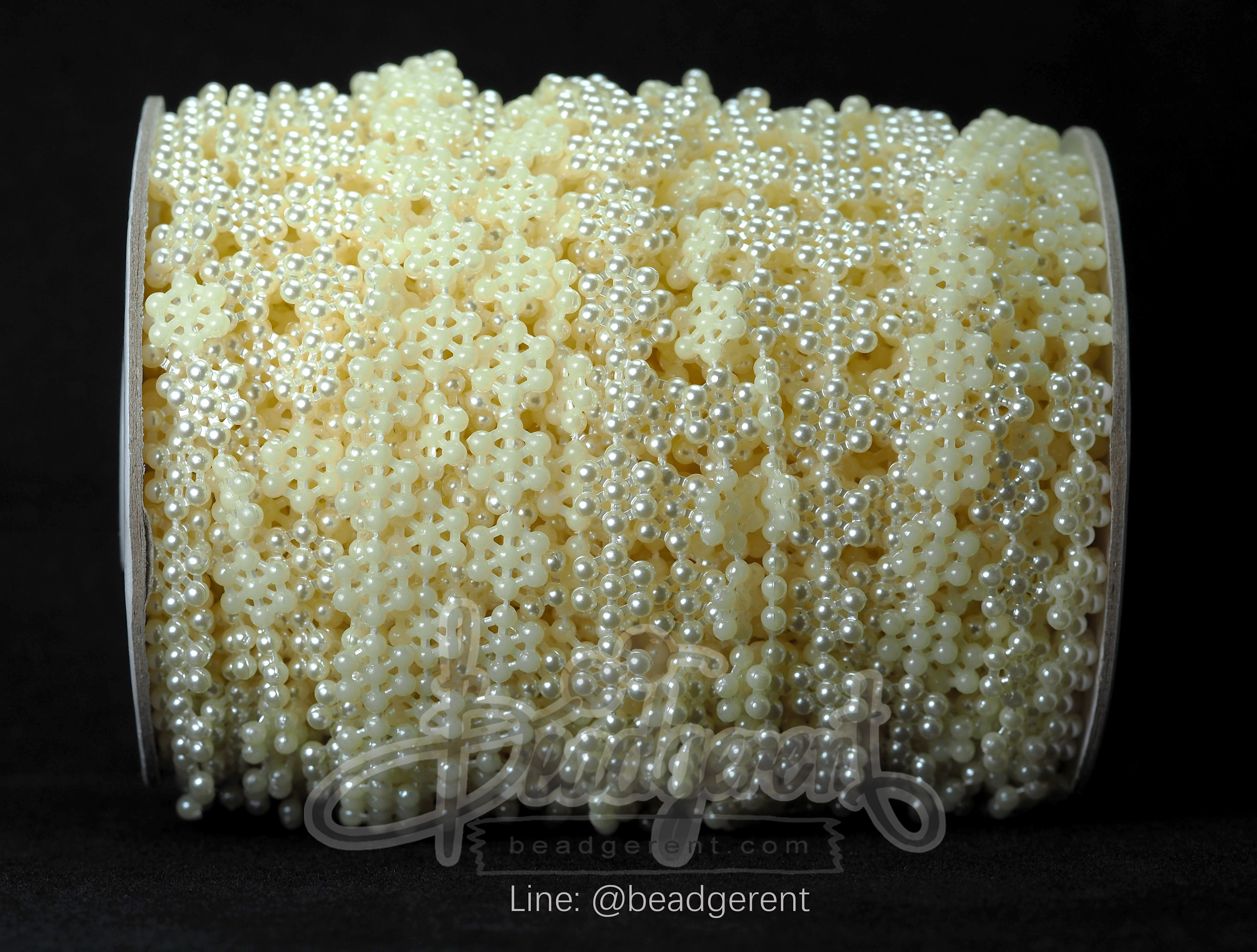 มุกเส้น 11มม. ลายมุกล้อม6จุด สีครีม (25 หลา) SKU-01851