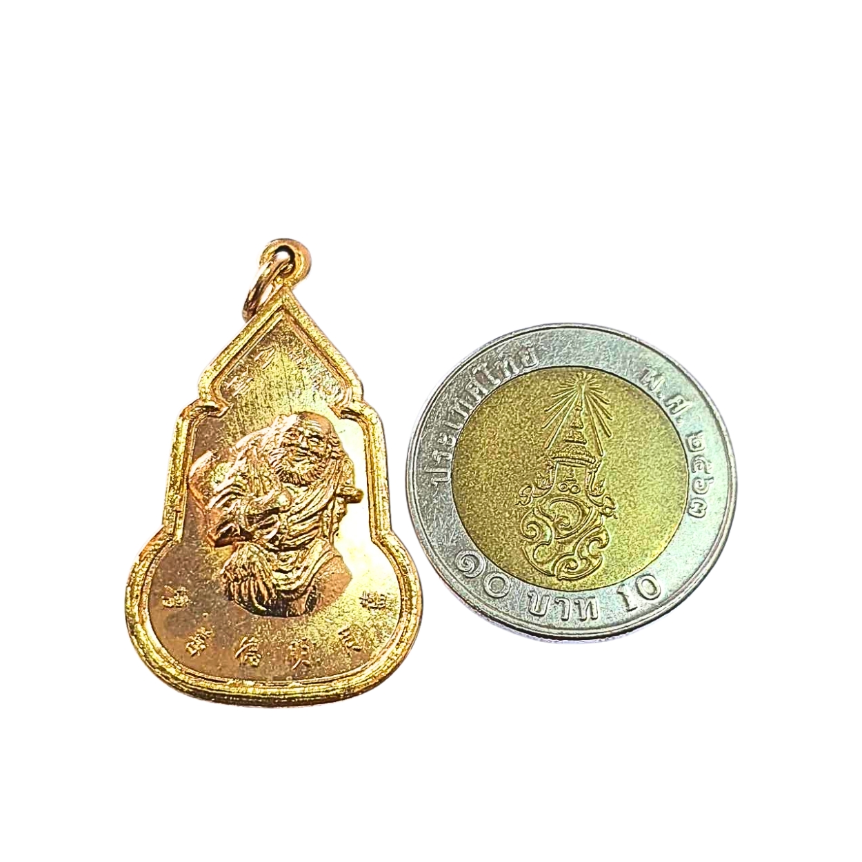 เหรียญหลี่เถียไกว่หรือลี้ทิไกว้8เซียนด้านหลังพระพุทธชินราชมูลนิธิสว่างกุศลธรรมสถานเนื้อกะไหล่ทอง