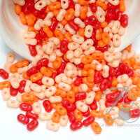 ลูกปัดพลาสติก 6มม. ลายเม็ดถั่ว คละสีส้ม (80 กรัม)