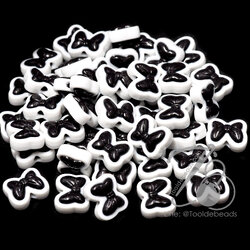 ลูกปัดอะคริลิค ทรงนูน 20*17มม. ลายโบว์ สีสีขาวดำ (50 กรัม) SKU-14688