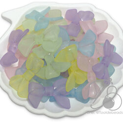 ลูกปัดอะคริลิค 30มม. ลายโบว์มีหางหยัก คละสีขุ่นหวาน (15 กรัม) SKU-16144