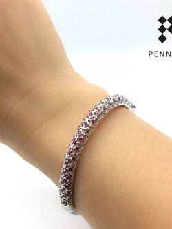 กำไลฉลุดอกฝังทับทิมกลมครึ่งวง